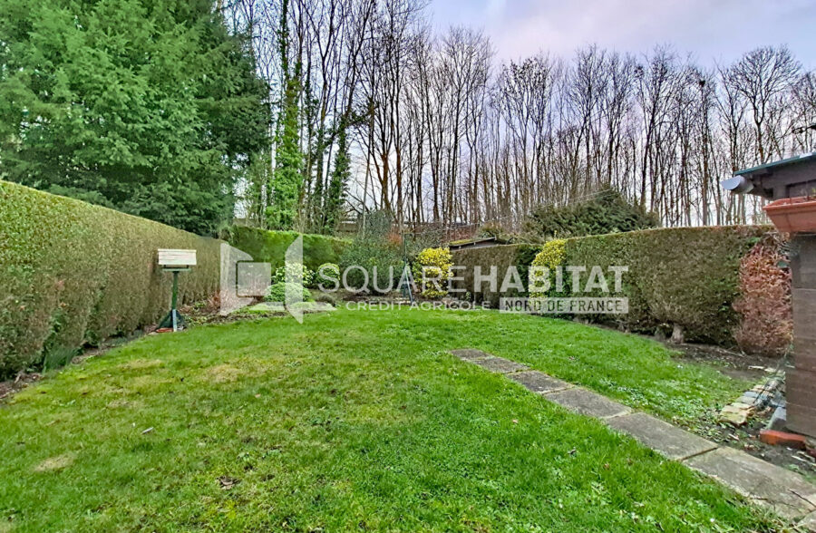 Maison avec jardin garage, 3 chambres alliant qualité et tranquillité.