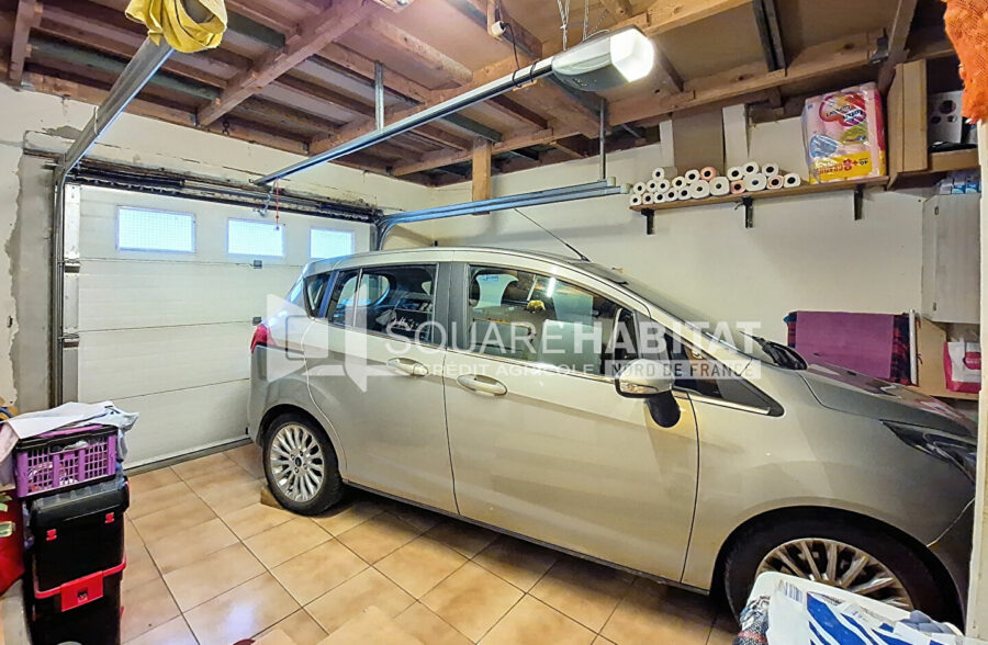 Maison avec jardin garage, 3 chambres alliant qualité et tranquillité.