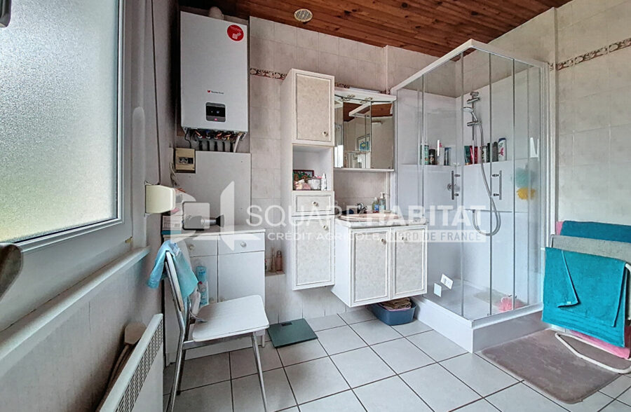 Maison avec jardin garage, 3 chambres alliant qualité et tranquillité.