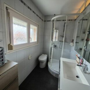 Maison rénovée comprenant 3 chambres, jardin, garage