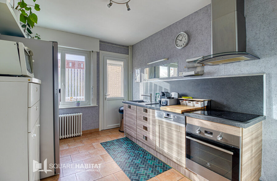 Maison  de ville avec garage et jardin