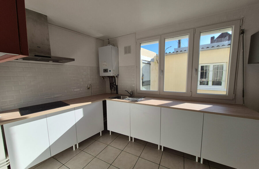 Immeuble de rapport comprenant 2 T3 162 m2.