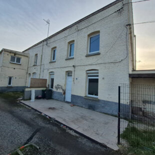 Immeuble comprenant 3 logements.