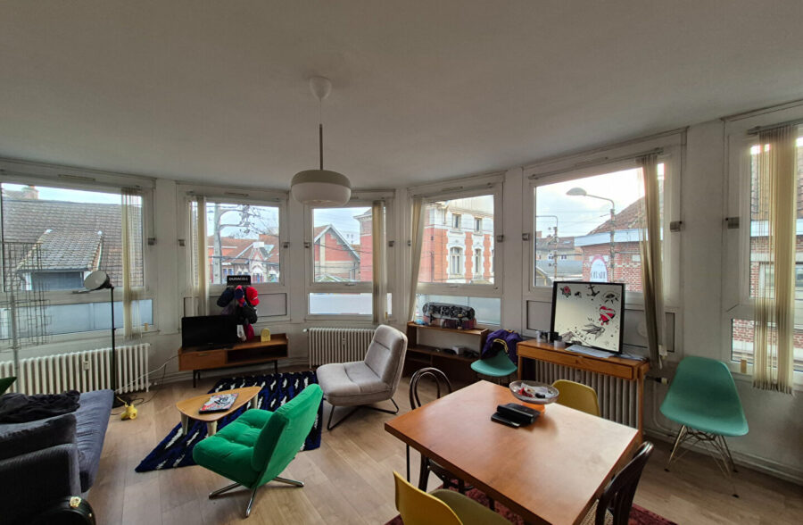 Appartement T3 avec cave, garage et parking privatif en centre ville