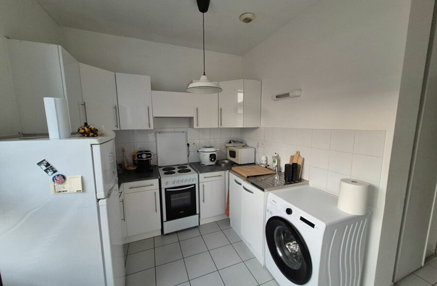 Appartement T3 avec cave, garage et parking privatif en centre ville