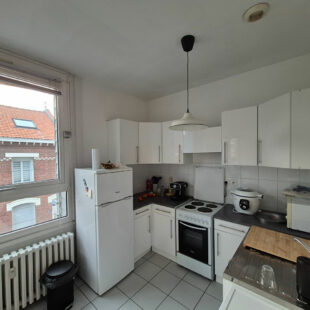 Appartement T3 avec cave, garage et parking privatif en centre ville