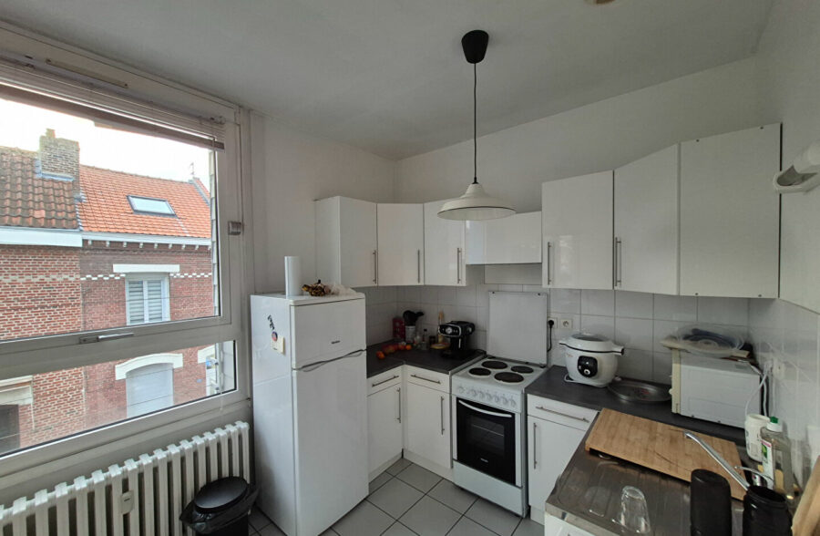 Appartement T3 avec cave, garage et parking privatif en centre ville