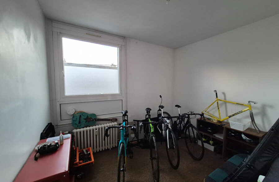 Appartement T3 avec cave, garage et parking privatif en centre ville