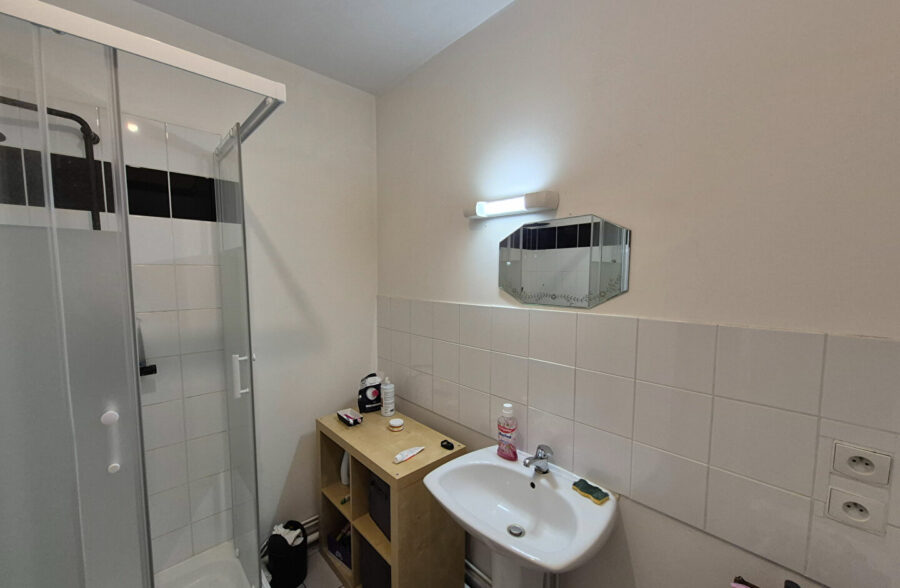 Appartement T3 avec cave, garage et parking privatif en centre ville