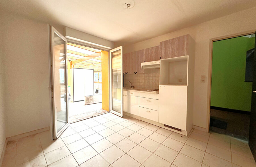 Immeuble avec Local Commercial et Duplex – Caudry