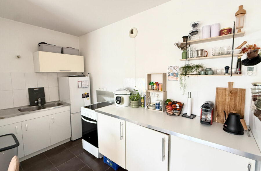 APPARTEMENT DE TYPE 2 AVEC TERRASSE, CAVE ET GARAGE