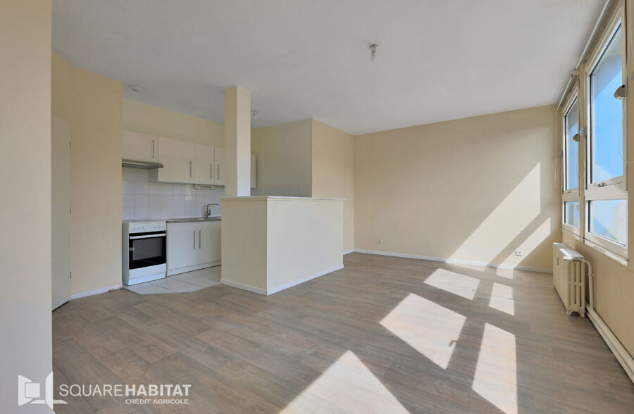 Appartement Lens 3 pièce(s) 67 m2 avec garage fermé et cave.