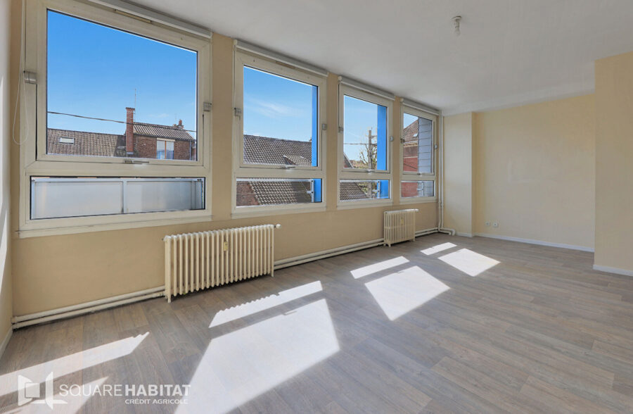 Appartement Lens 3 pièce(s) 67 m2 avec garage fermé et cave.