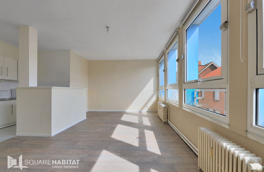 Appartement Lens 3 pièce(s) 67 m2 avec garage fermé et cave.