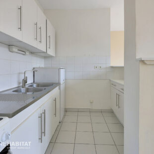 Appartement Lens 3 pièce(s) 67 m2 avec garage fermé et cave.