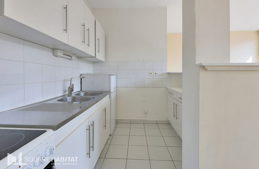 Appartement Lens 3 pièce(s) 67 m2 avec garage fermé et cave.