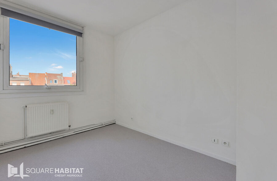Appartement Lens 3 pièce(s) 67 m2 avec garage fermé et cave.