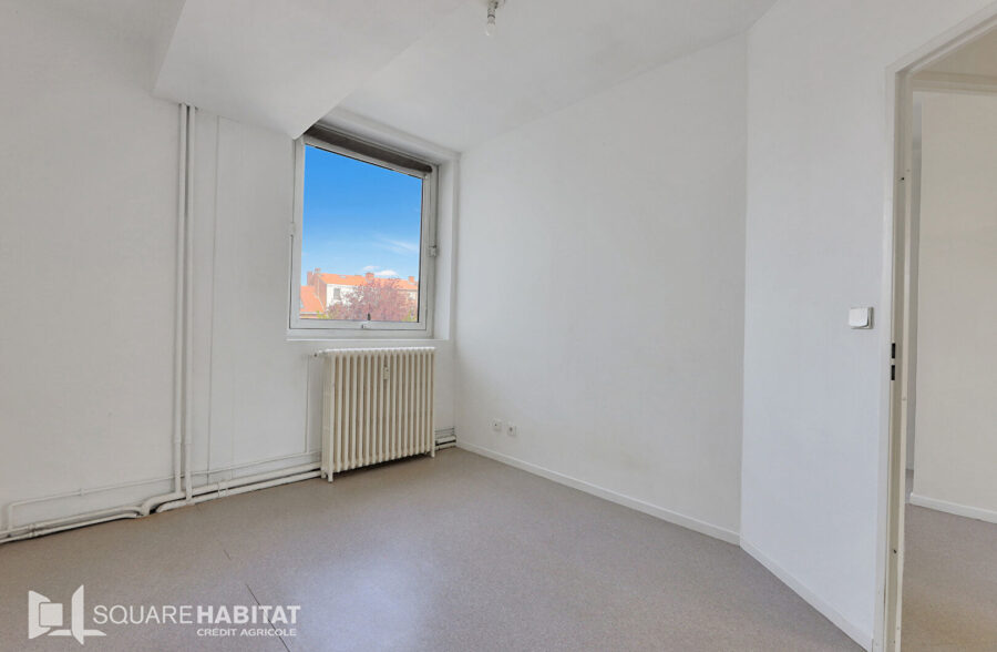 Appartement Lens 3 pièce(s) 67 m2 avec garage fermé et cave.