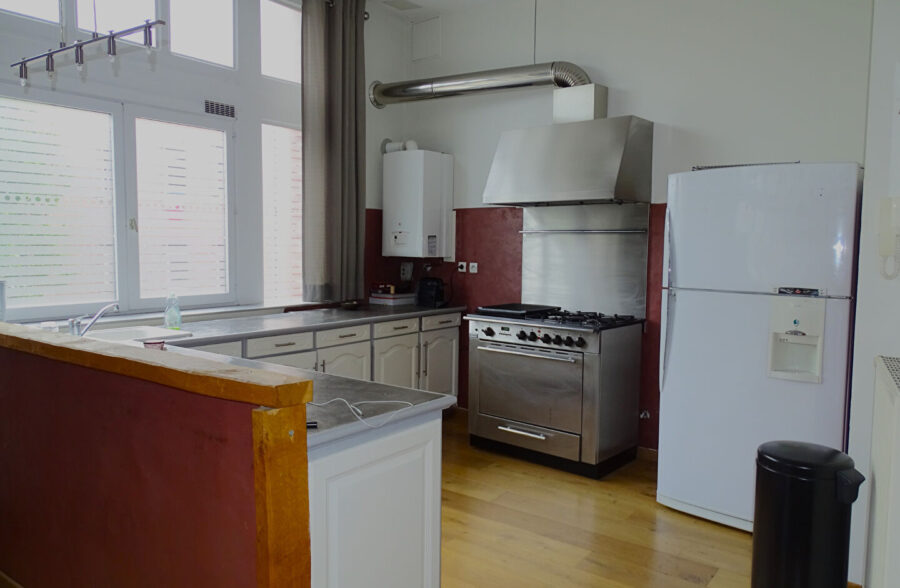 IMMEUBLE 3 LOTS DONT 1 SURFACE COMMERCIALE