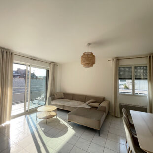 Appartement 2 chambres, terrasse, cave et garage
