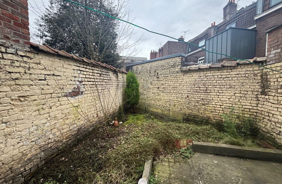 Appartement t2 en rez-de-chaussée avec jardin et cave à Lille, quartier parc Jean-Baptiste Lebas