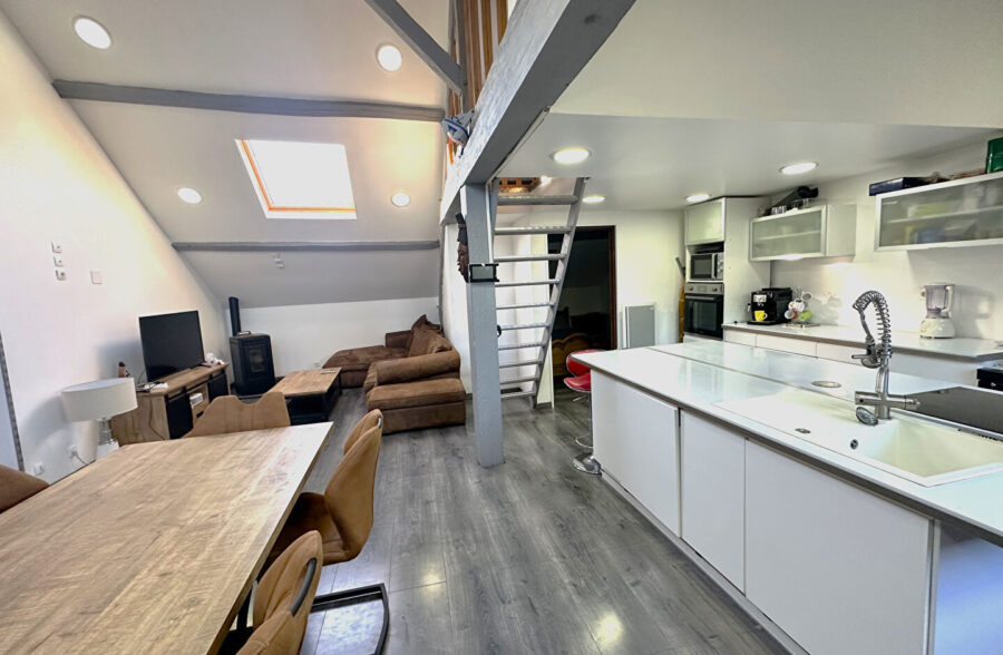 Immeuble avec local commercial et logements en plein centre de Caudry