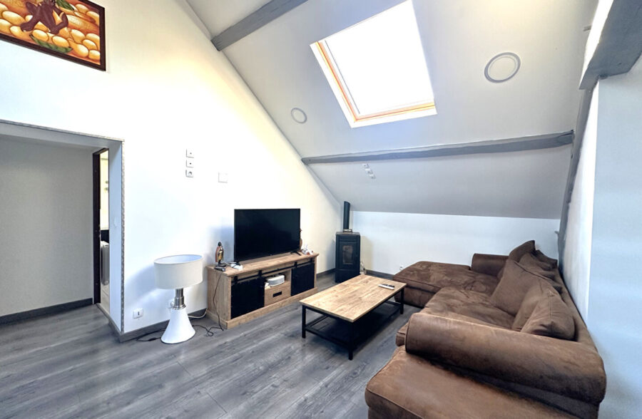 Immeuble avec local commercial et logements en plein centre de Caudry