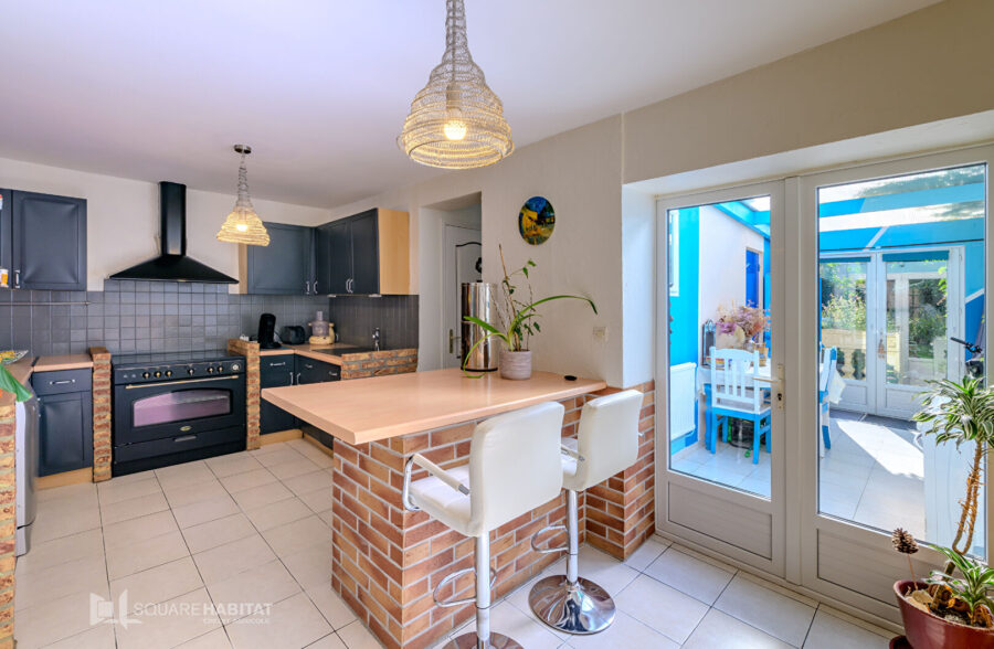 Maison de ville sans travaux avec jardin et véranda