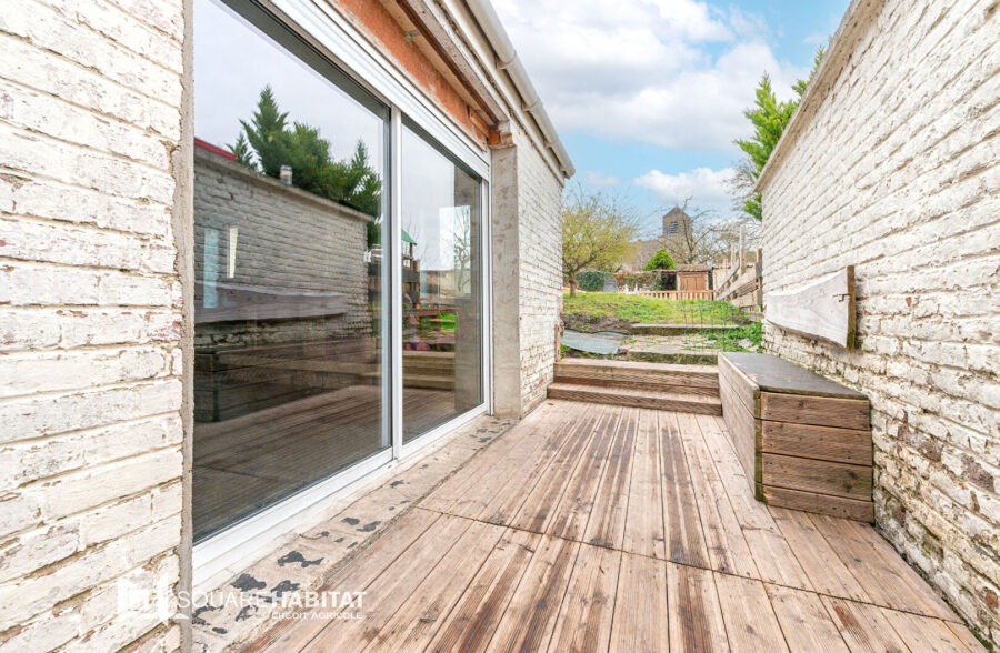 Maison individuelle rénovée comprenant 3 chambres, un jardin et un garage