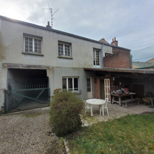 Maison semi mitoyenne avec large passage sur le coté