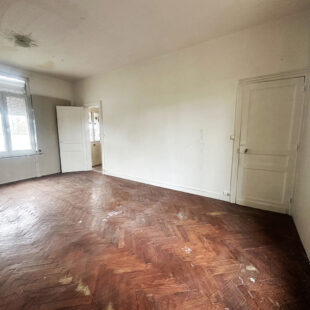 Maison semi individuelle à rénover en plein centre de Caudry.