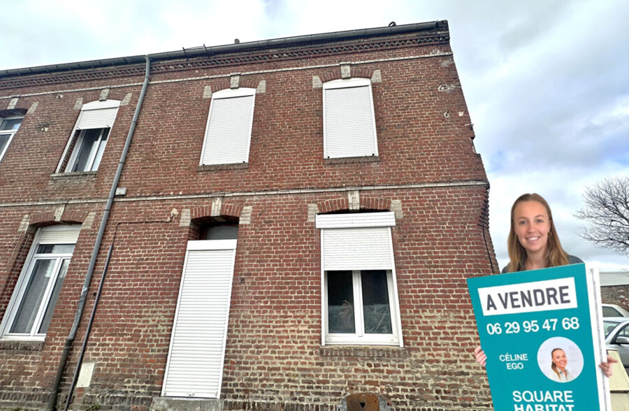 Maison semi individuelle à rénover en plein centre de Caudry.