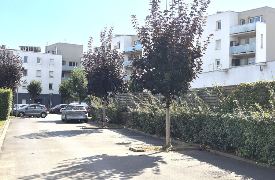 Type 4 en résidence avec balcon et parking privé