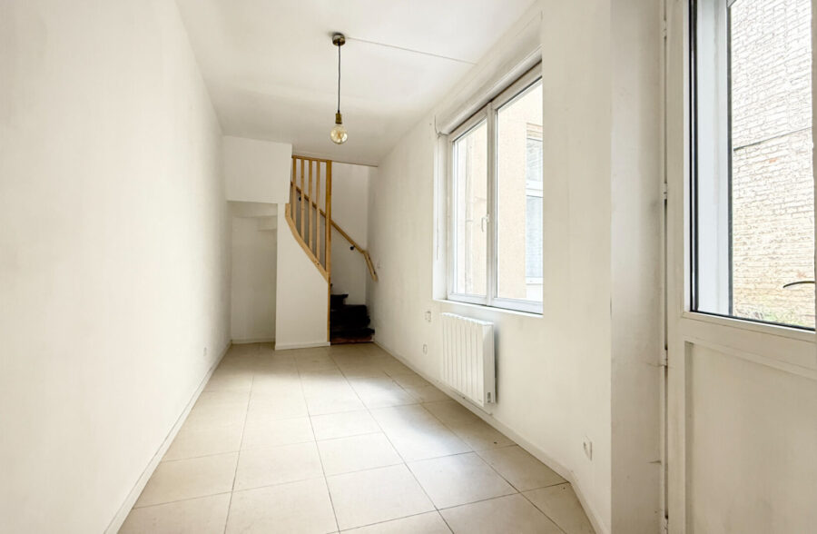 EXCLUSIVITE : APPARTEMENT EN DUPLEX AVEC CAVE  PROCHE METRO