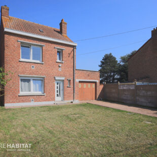 Maison individuelle sur Steenbecque avec cave, garage, dépendance.