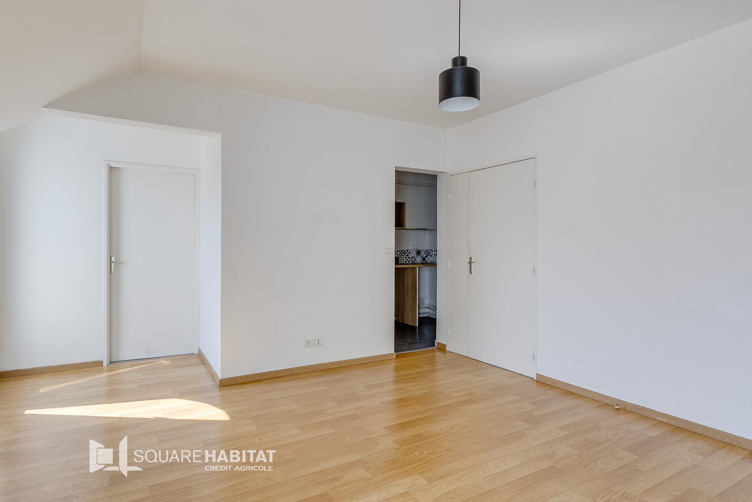 Appartement de type 2 avec balcons, parking et cave
