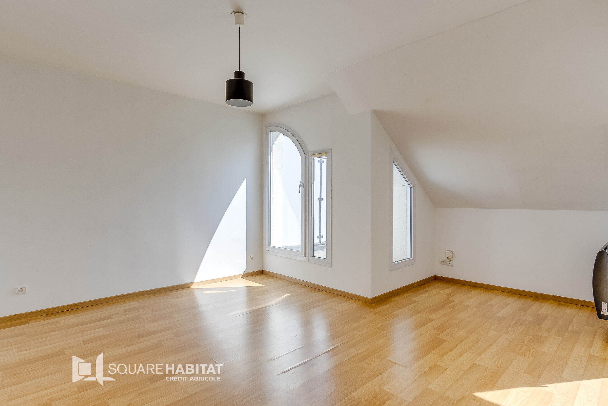 Appartement de type 2 avec balcons, parking et cave