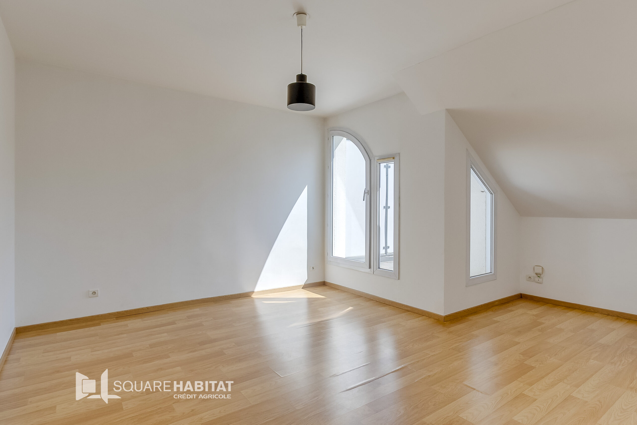 Appartement de type 2 avec balcons, parking et cave