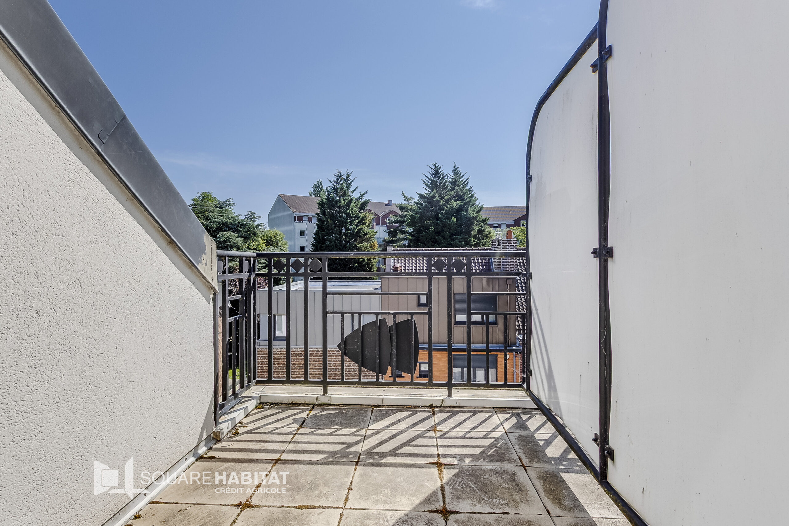 Appartement de type 2 avec balcons, parking et cave