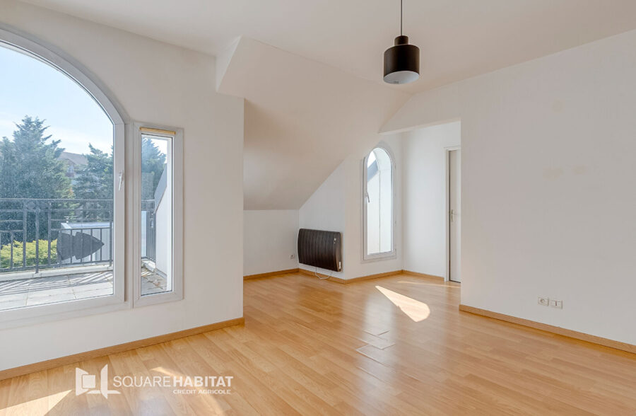Appartement de type 2 avec balcons, parking et cave