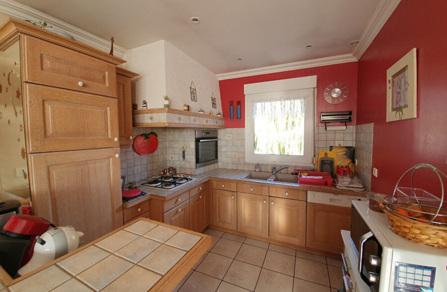 Appartement  T3 de 73 m2 + local commercial de 44 m² avec garage