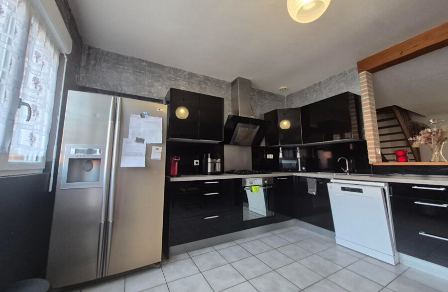 Maison170m2  + plain pied  69m2  et garage double.