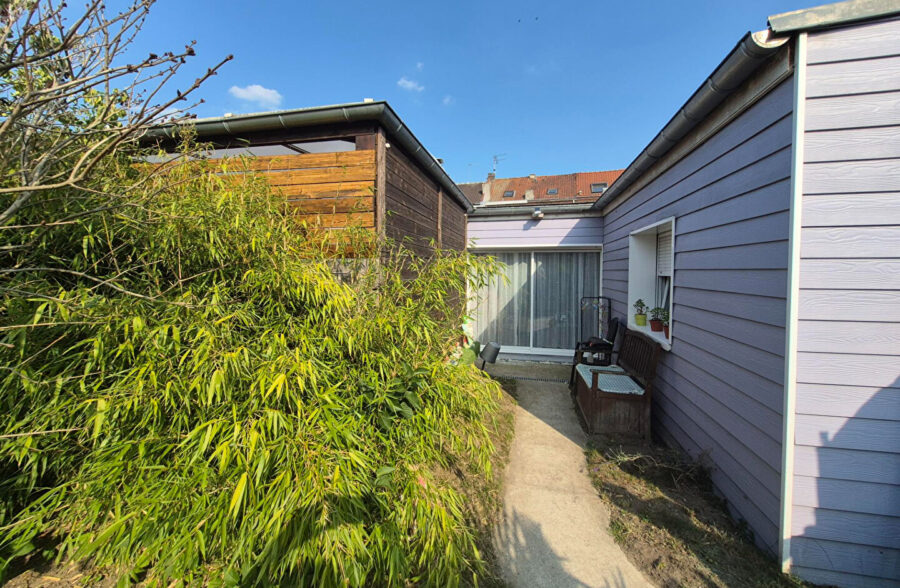 Maison170m2  + plain pied  69m2  et garage double.