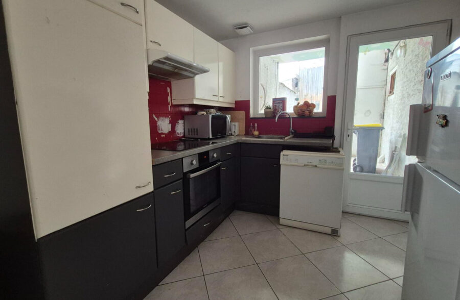 Maison avec garage, 3 chambres et extérieur