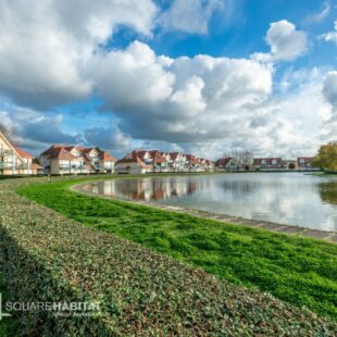 Face à un lac bel appartement type 2 pièces en rez-de-jardin excellent état avec parking  Sous compromis 