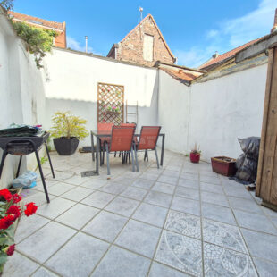 Maison au coeur de Lannoy, avec 3 chambres et un espace extérieur.