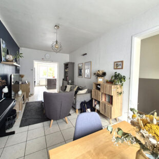 Charmante maison 1930 semi-individuelle avec garage et grand jardin !