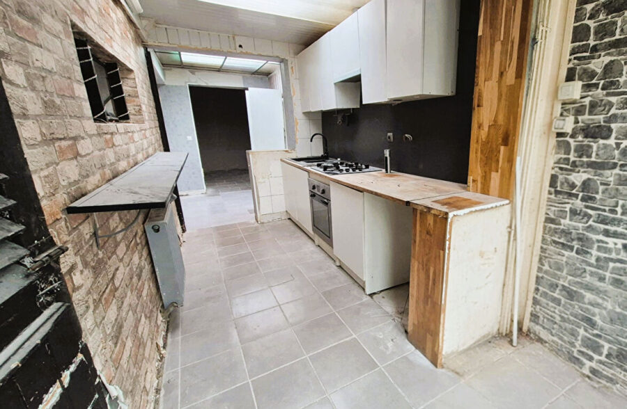 Centre Halluin Maison 120m², quatre chambres, garage.