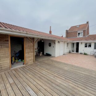 Maison individuelle semi plain pied avec jardin et garage
