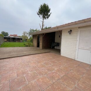Maison individuelle semi plain pied avec jardin et garage
